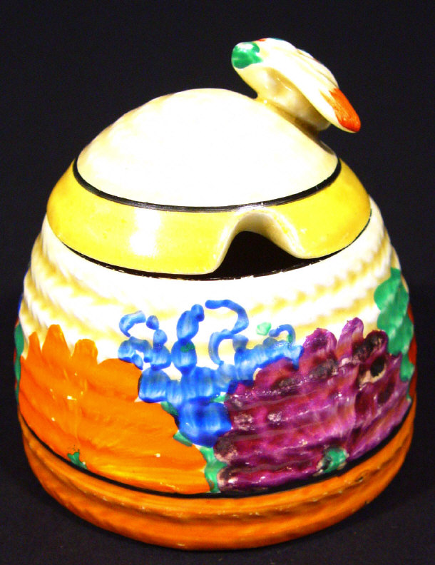 Appraisal: Clarice Cliff Bizarre beehive shaped preserve pot hand painted with