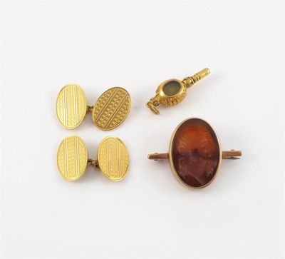 Appraisal: A pair of ct gold oval cuff links engine turned