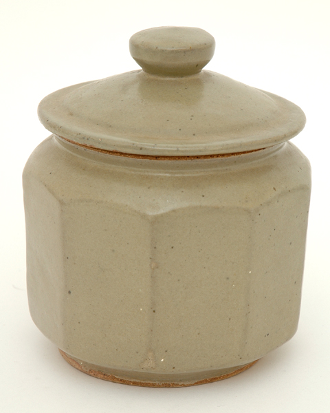 Appraisal: HAROLD HUGHAN Victoria circa Faceted stoneware lidded jar green celadon