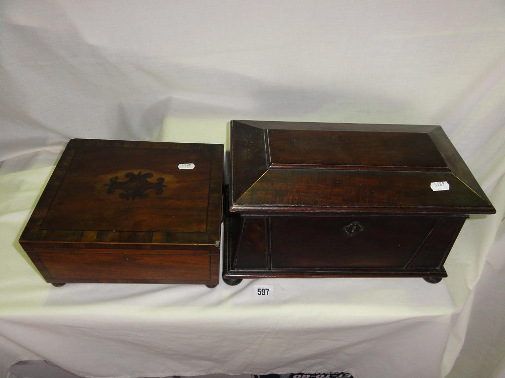 Appraisal: A sarcophagus shaped mahogany tea caddy and a mahogany sewing