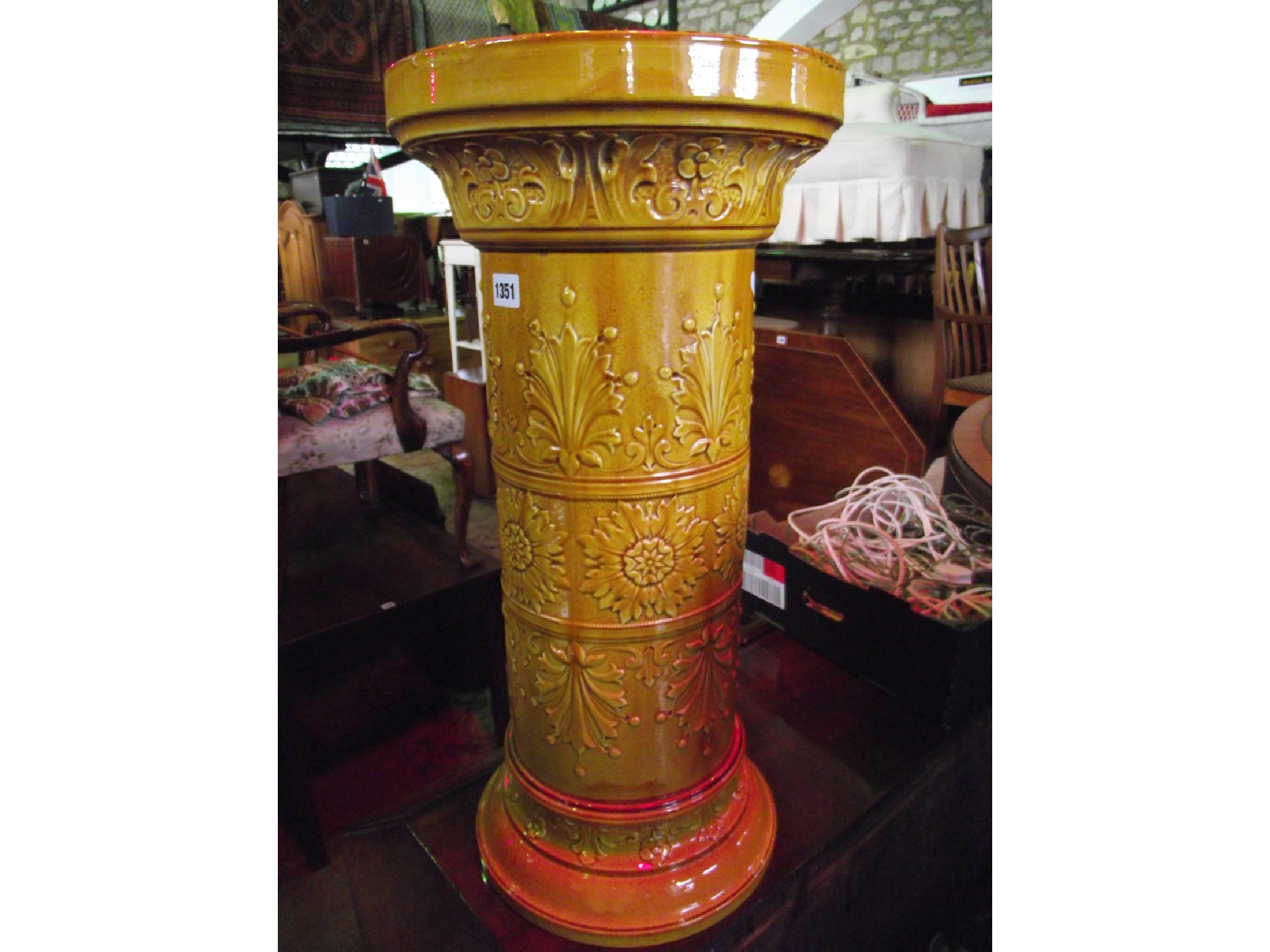 Appraisal: A late Victorian Edwardian yellow glazed ceramic stick stand of