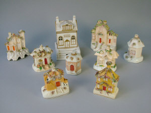 Appraisal: A quantity of Staffordshire pastille burners a large removable house