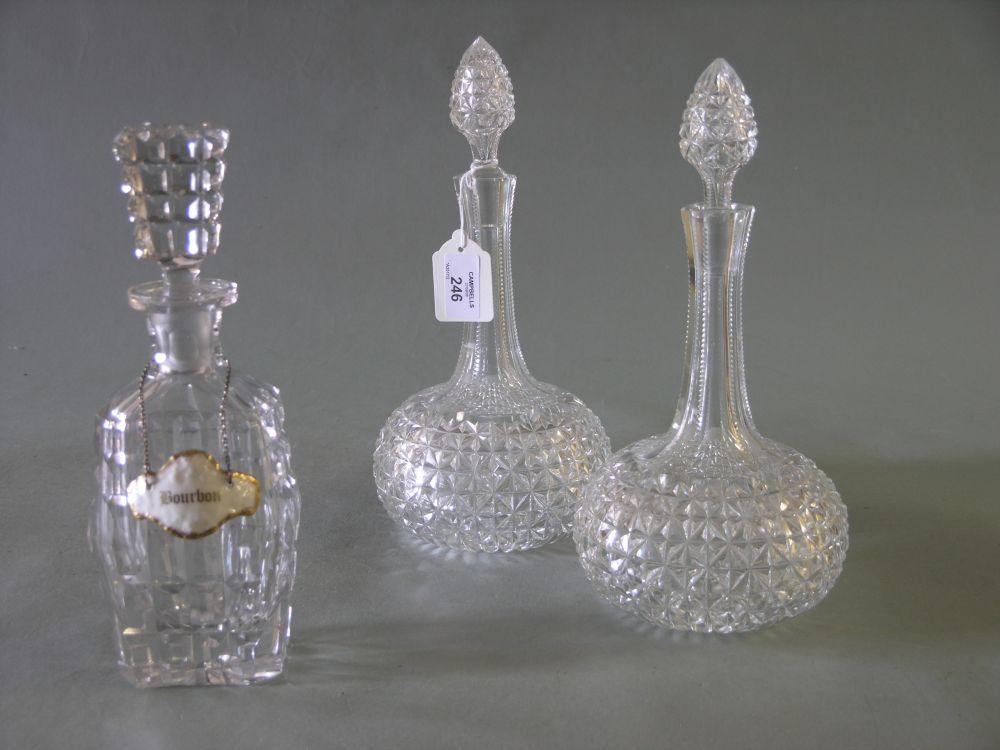 Appraisal: A pair of cut glass decanters globe and shaft form