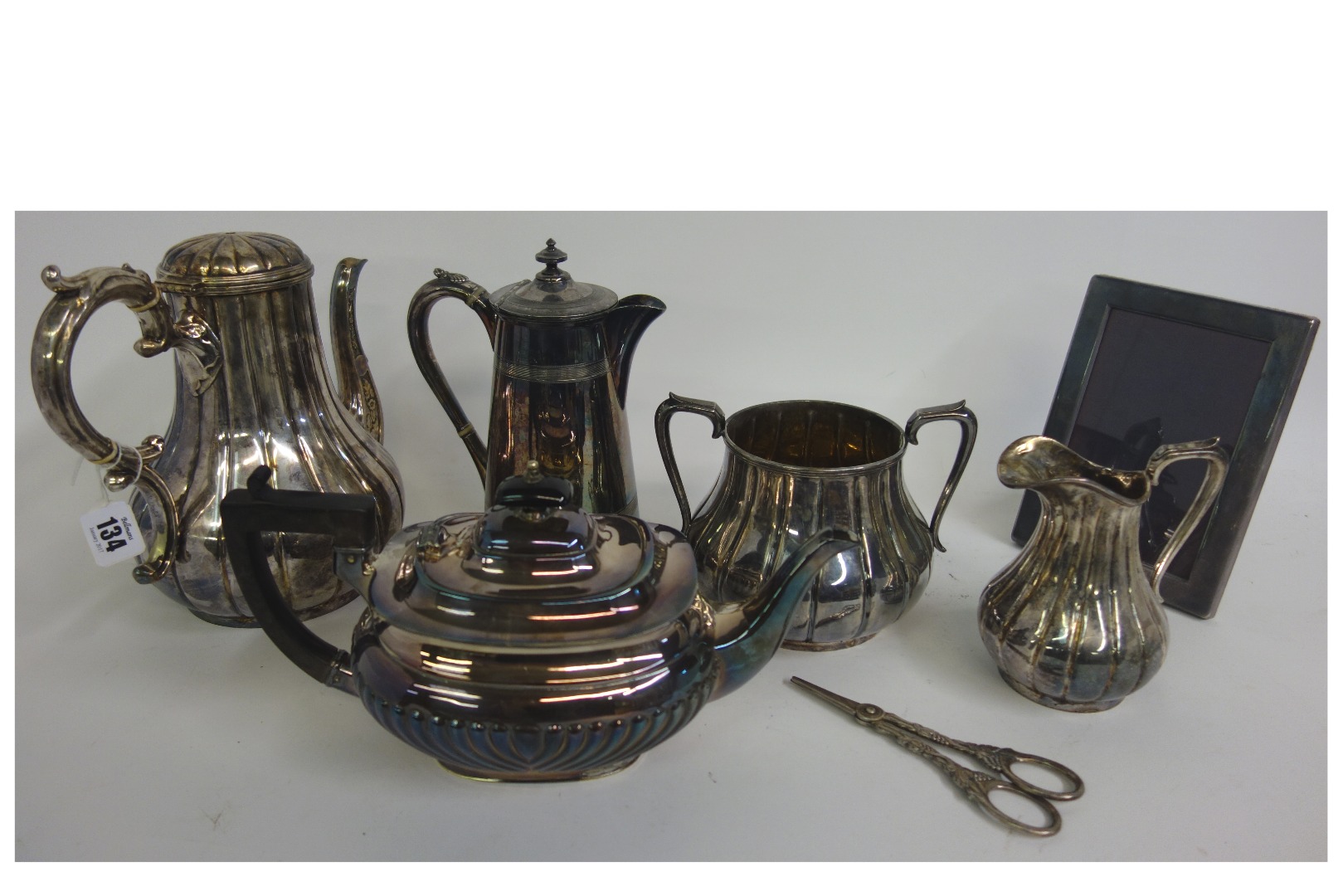 Appraisal: A Victorian electroplate three piece coffee service with lobed and