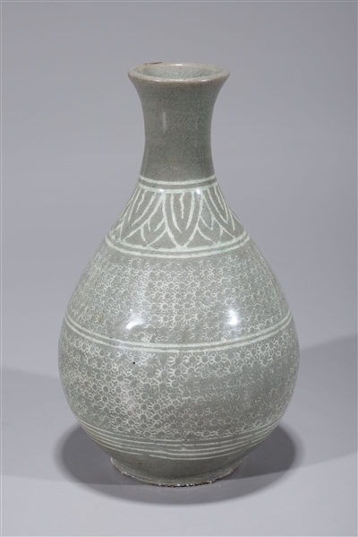 Appraisal: Korean celadon glazed vase with all-over geometric designs glaze flaws