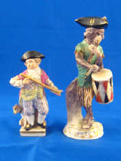 Appraisal: Meissen An early monkey drummer some losses crossed swords mark