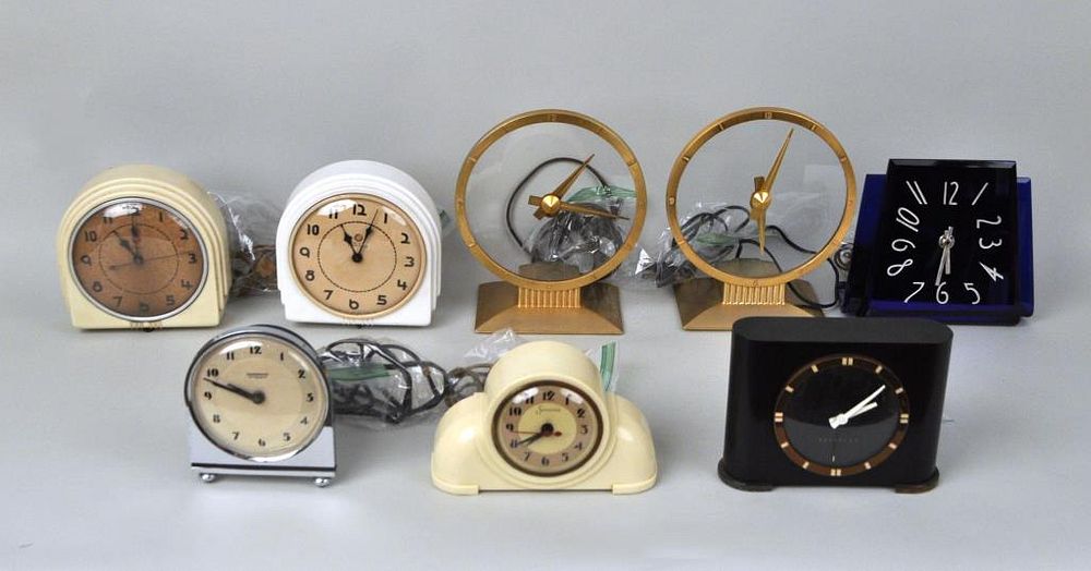 Appraisal: Group Eight MCM Table Clocks comprising Jefferson Golden Hour Hammond