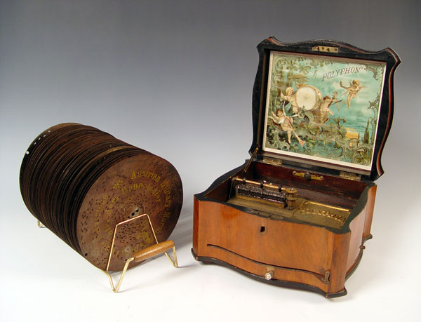 Appraisal: POLYPHON R SERPENTINE MUSIC BOX WITH DISCS Serpentine front case