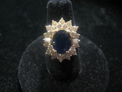 Appraisal: carat yellow gold sapphire and diamond cluster ring th century