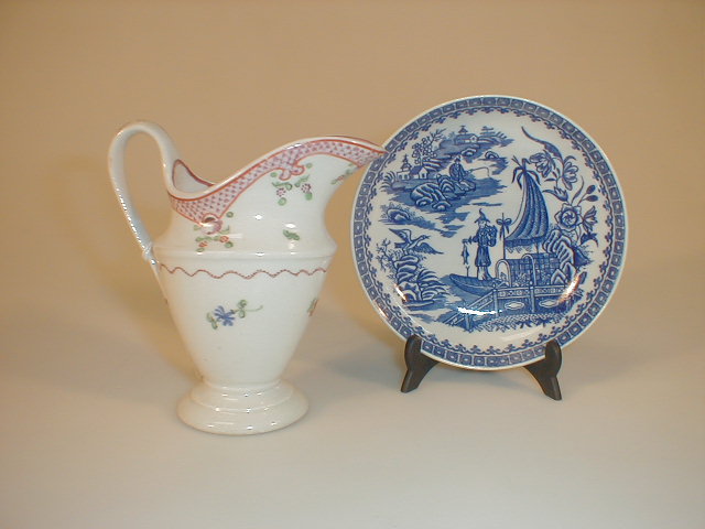 Appraisal: A Newhall porcelain helmet cream jug painted with a diaper