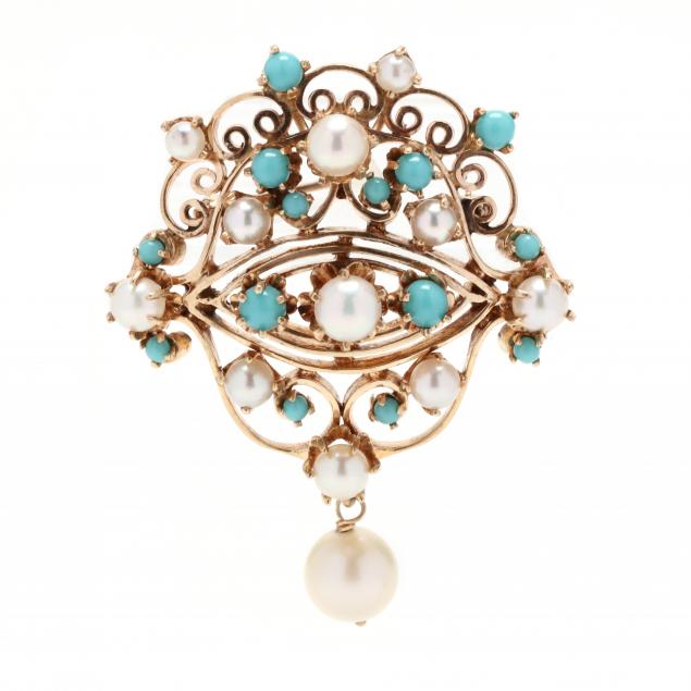 Appraisal: GOLD TURQUOISE AND PEARL BROOCH Designed in a scrolled medallion