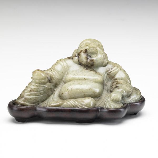 Appraisal: Jade carving of seated Hotai th th C In mottled