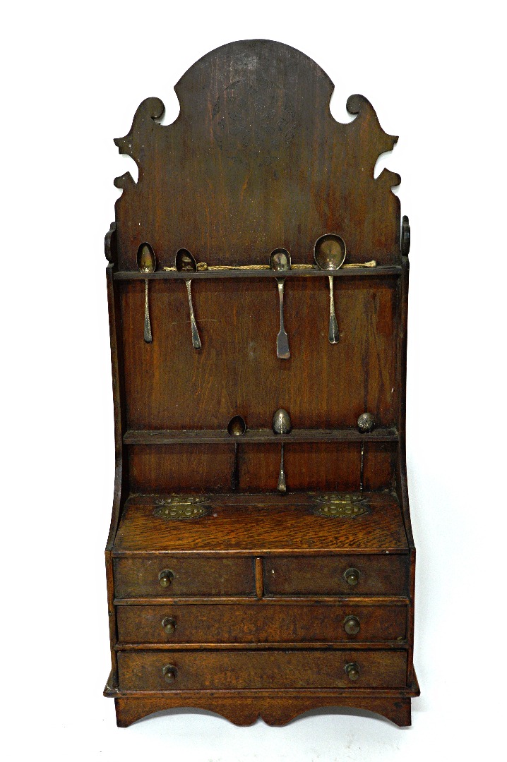 Appraisal: A th century oak spoon rack formed as a miniature