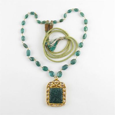 Appraisal: An Indian carved emerald and diamond pendant The large rectangular