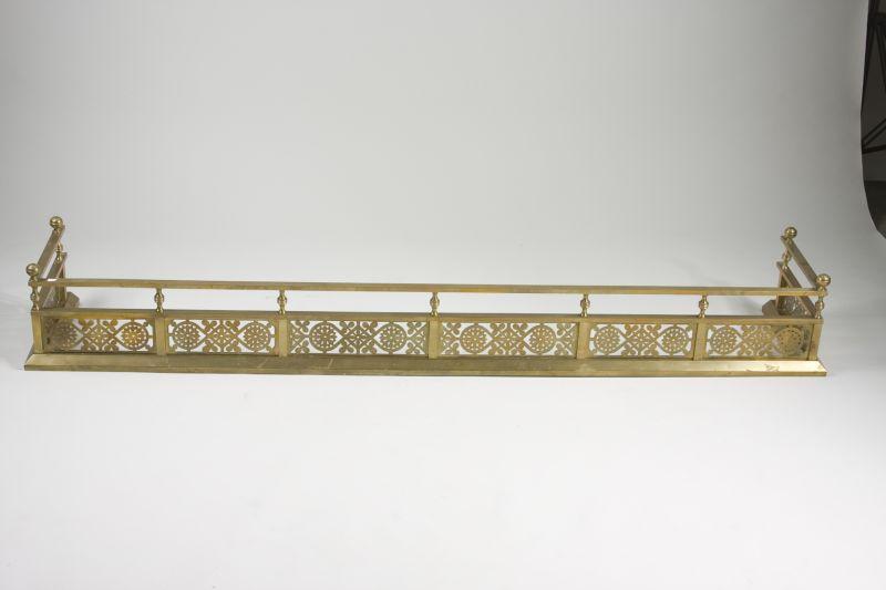 Appraisal: Colonial Revival Pierced Brass Fireplace Fender designed for an unusually