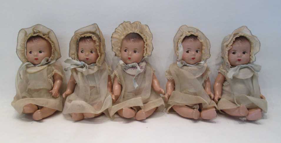 Appraisal: FIVE MADAME ALEXANDER DIONNE QUINTUPLETS DOLLS composition construction with molded