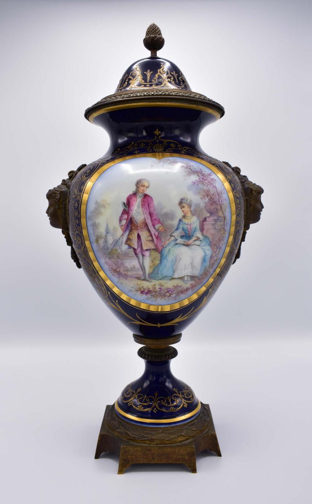 Appraisal: SEVRES BRONZE MOUNTEDD COBALT GROUND PORCELAIN LIDDED URNLate th Century