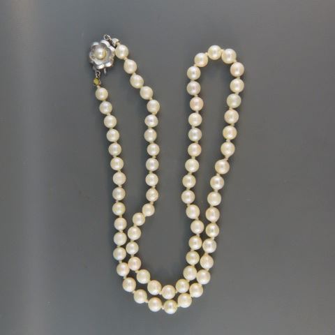 Appraisal: Pearl Necklace pearls to mm silver floral clasp long