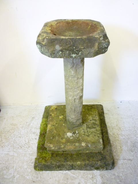 Appraisal: A SANDSTONE BIRDBATH the square stem top with shallow bowl