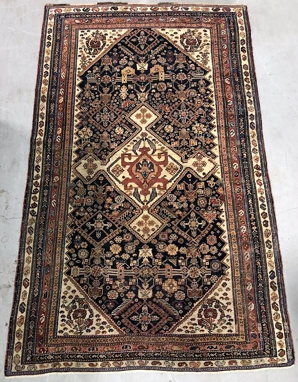 Appraisal: Caucasian Carpet with Geometric Patterns Caucasian carpet with geometric patterns