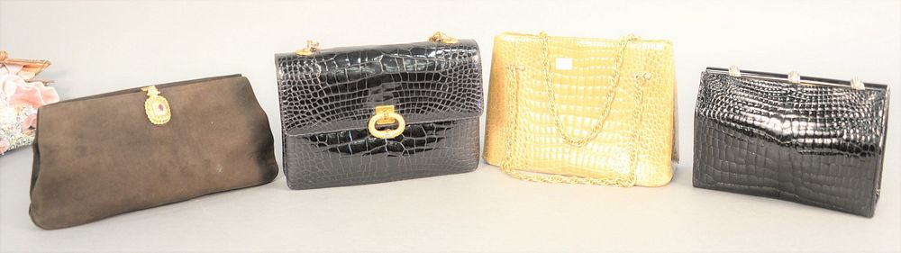 Appraisal: Group of four purses to include clutch purse charcoal gray