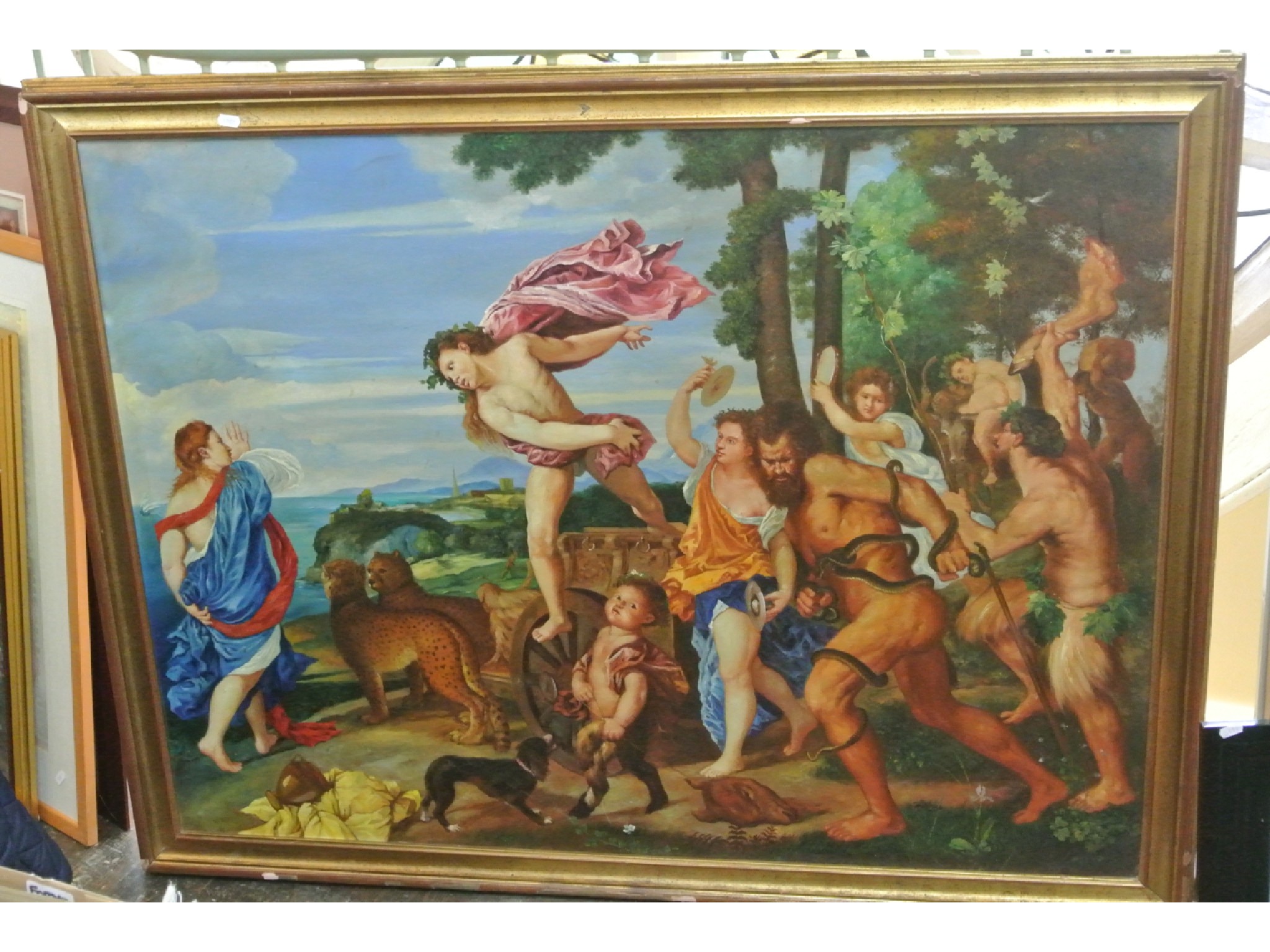 Appraisal: A large oil painting on board after Titian-Bacchus and Ariadne