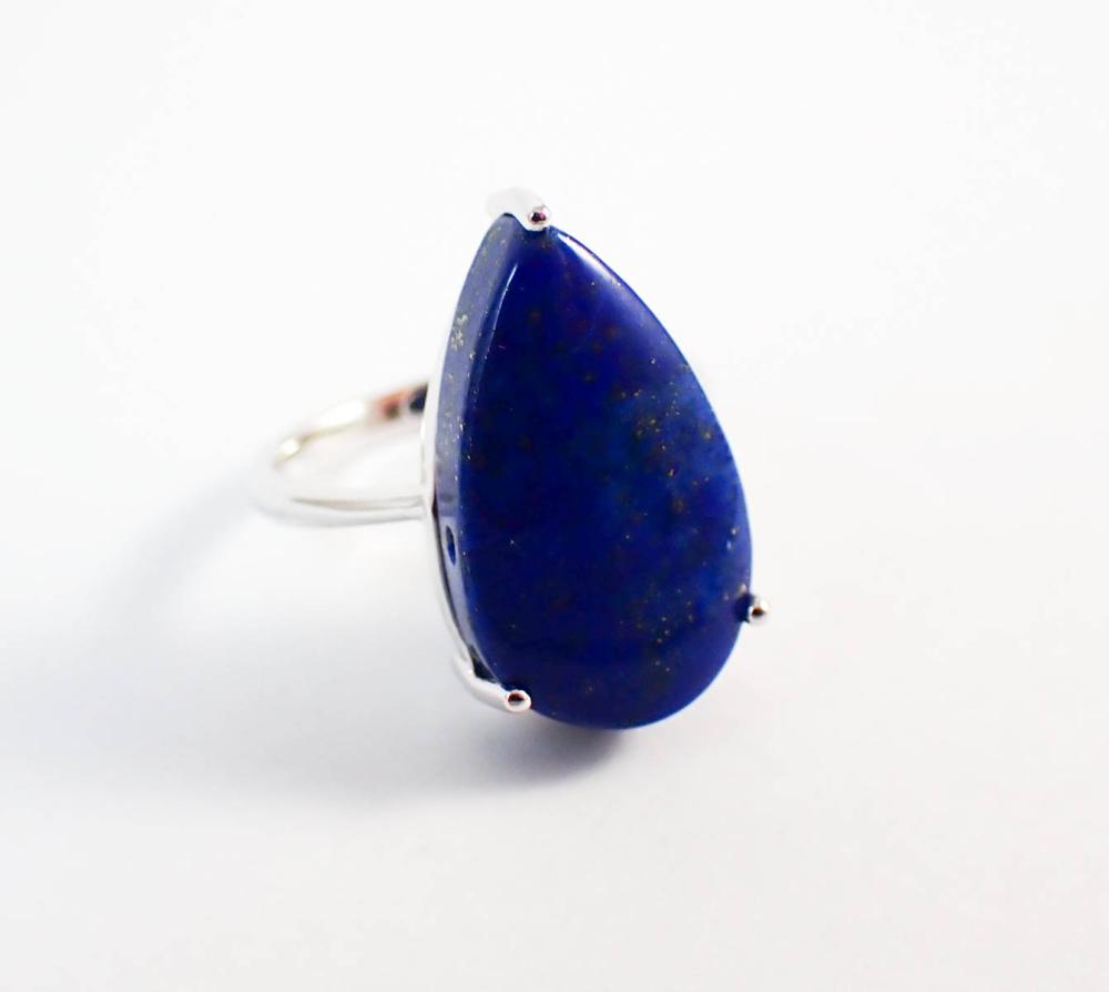 Appraisal: LAPIS LAZULI AND FOURTEEN KARAT WHITE GOLD RING with three