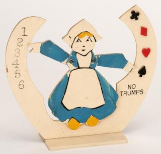 Appraisal: Trump Indicator and Table Marker Little Dutch Girl Circa Celluloid