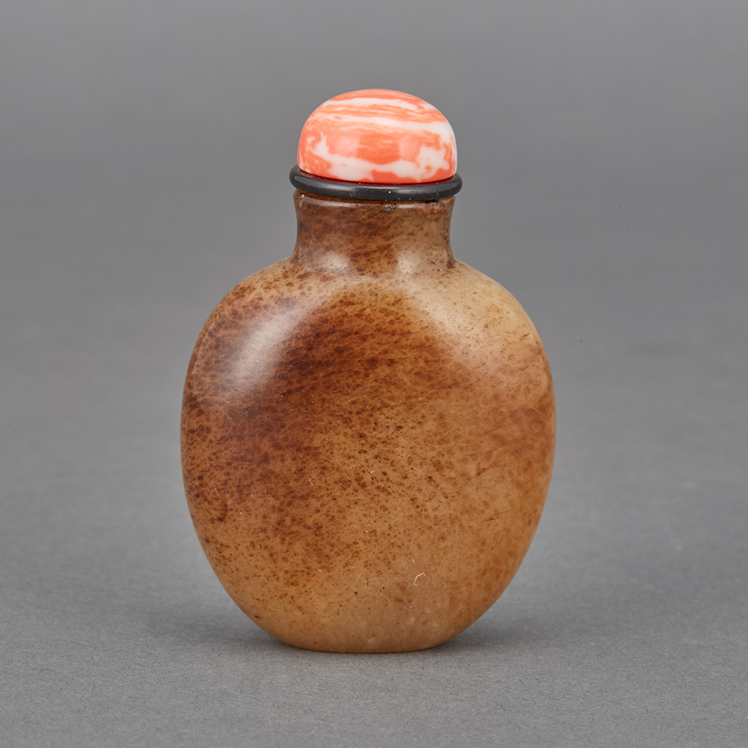 Appraisal: Chinese Brown Jade Snuff Bottle Qing Dynasty The ovoid form