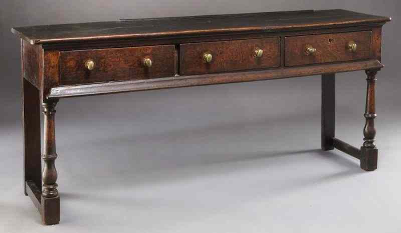 Appraisal: Early English three drawer oak dresser base the turned front