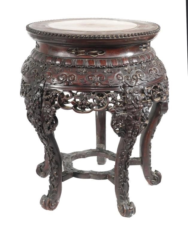 Appraisal: Antique Chinese carved wooden end table with floral motif and