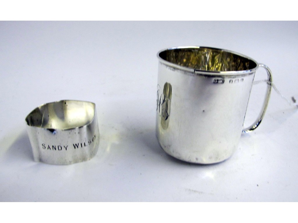 Appraisal: Lot comprising silver mug and napkin ring