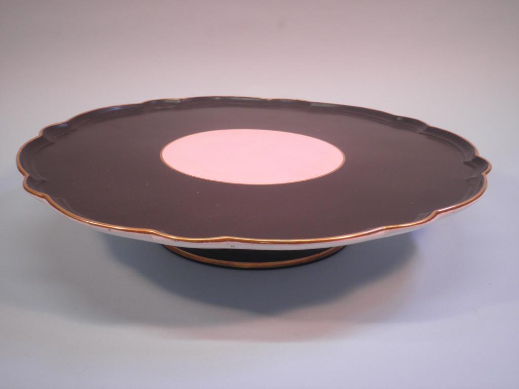 Appraisal: A Minton porcelain 'Lazy Susan' decorated in black and pink