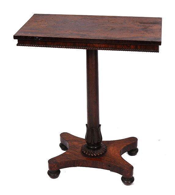 Appraisal: A GEORGE IV ROSEWOOD RECTANGULAR OCCASIONAL TABLE on tapering column