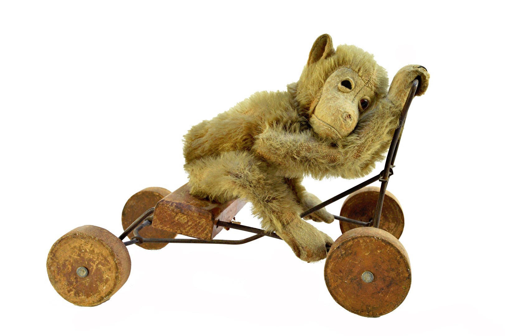 Appraisal: A Steiff peddling monkey pre-war with golden fur and jointed