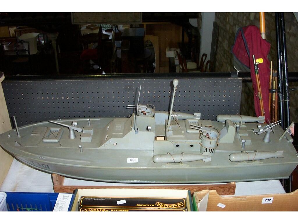 Appraisal: A plywood model of an American military launch armed with