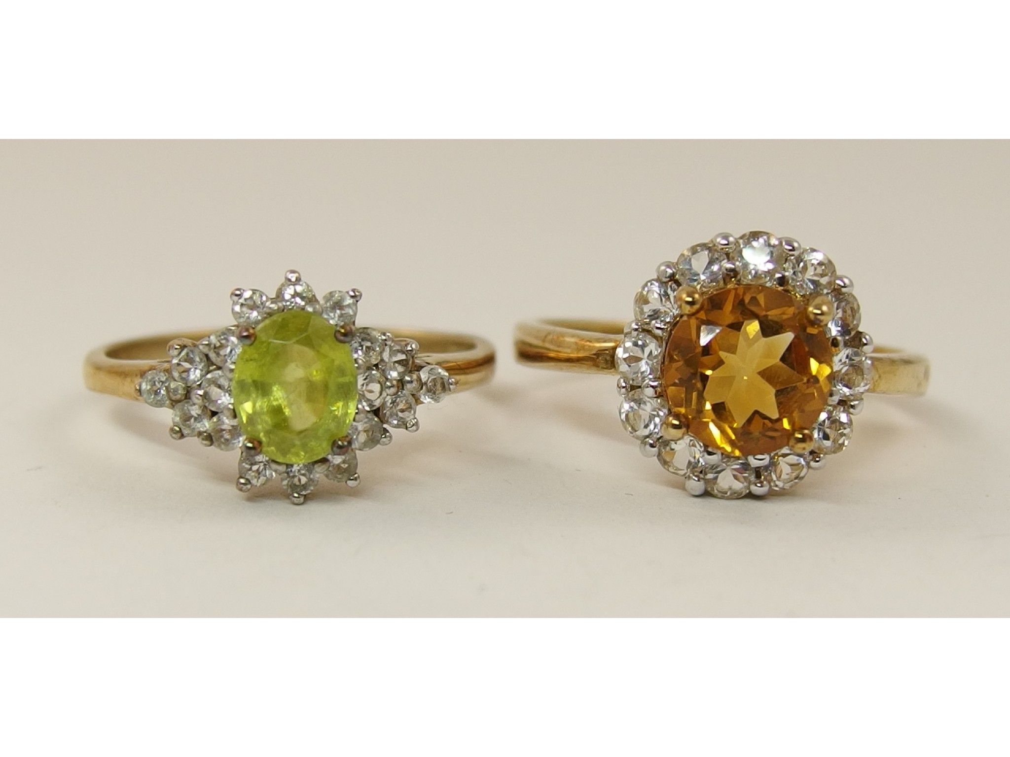 Appraisal: A ct citrine and white topaz ring and a ct