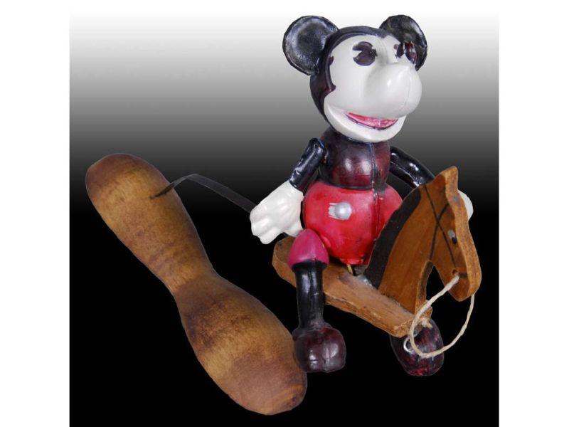 Appraisal: Walt Disney Celluloid Mickey Mouse Riding Wood Hob Description ''