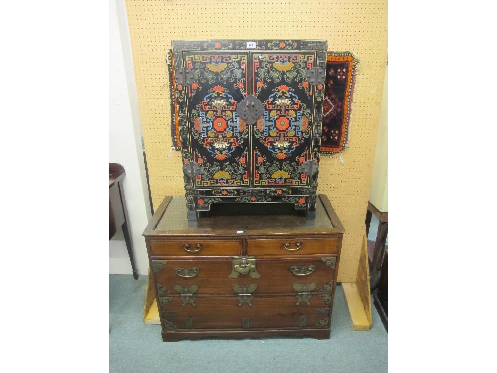 Appraisal: Oriental hardwood collectors chest and an oriental lacquered two door