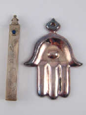 Appraisal: A sterling silver Hamsa by Devora Jaron and a silver