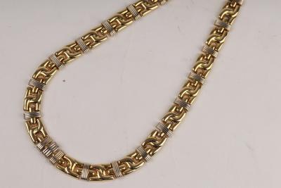 Appraisal: A French gold necklace by Caplain Paris of flattened fancy