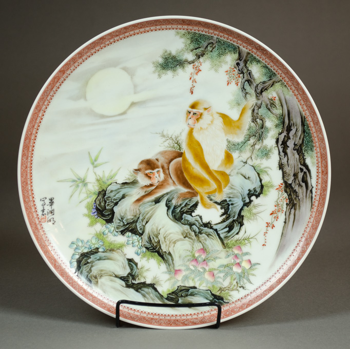 Appraisal: CHINESE FAMILLE ROSE PORCELAIN FOOTED PLATE depicting two monkeys on