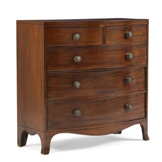 Appraisal: REGENCY BOWFRONT MAHOGANY CHEST OF DRAWERS Two over three graduated