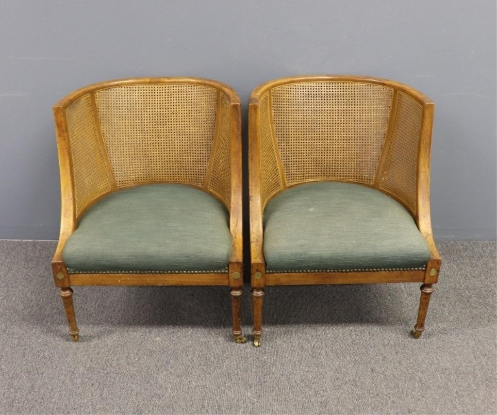 Appraisal: Pair of fruitwood cane back bergeres' circa h x w