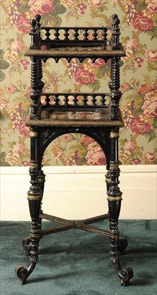 Appraisal: AESTHETIC MOVEMENT BRASS-MOUNTED AND ZSOLNAY FAIENCE TILE-INSET EBONIZED NIGHTSTAND The