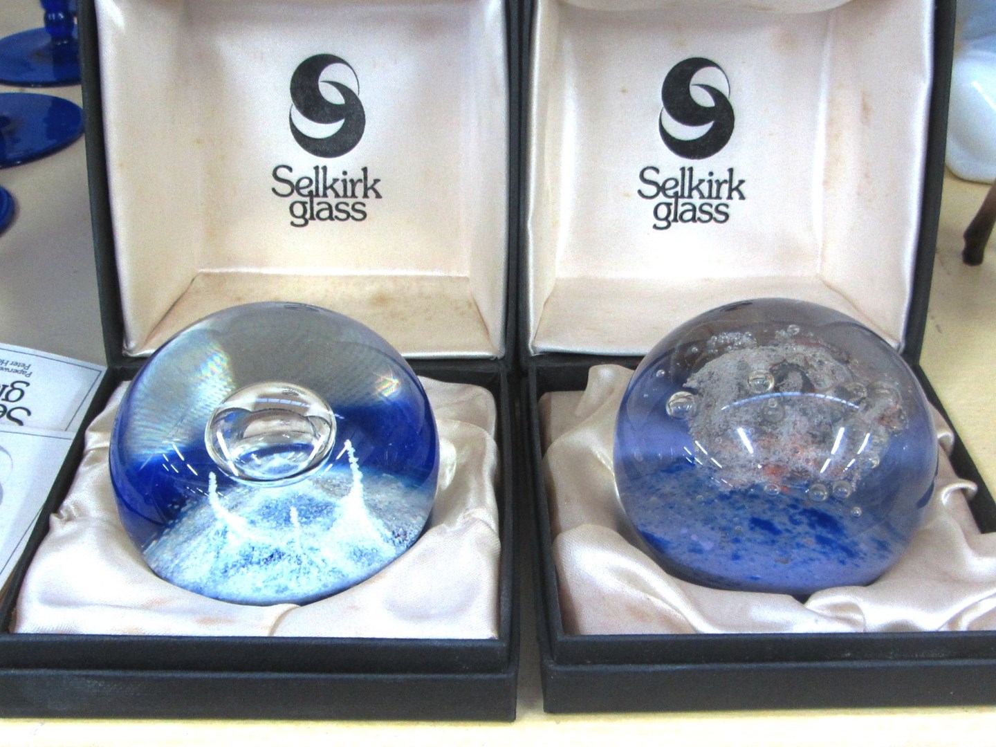 Appraisal: A group of eight glass paperweights comprising two Selkirk glass