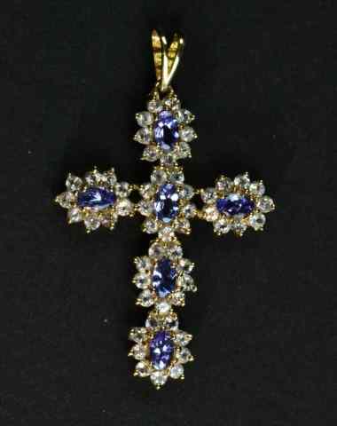 Appraisal: K Gold Oval Tanzanites Cross PendantA K - g yellow