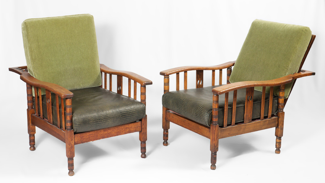 Appraisal: PAIR OF TRANSITIONAL OAK MORRIS CHAIRS Oak frame with reclining