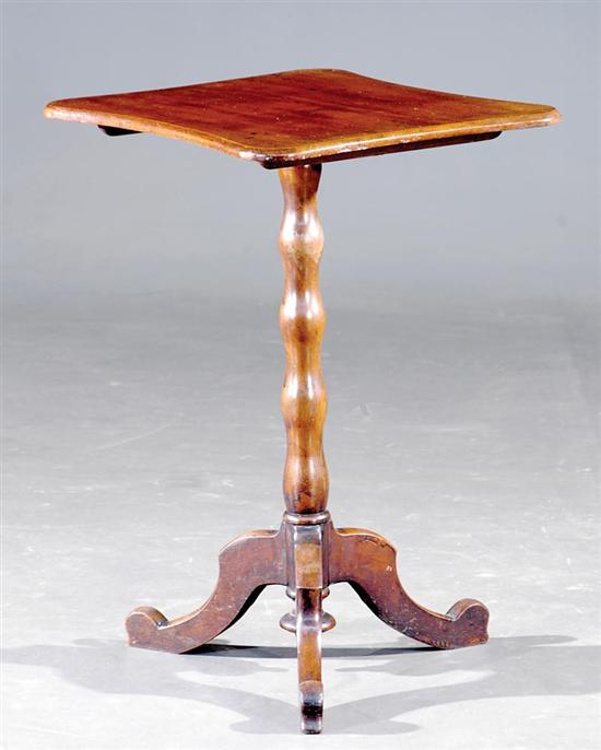 Appraisal: English mahogany tilt-top table th century shaped top over turned