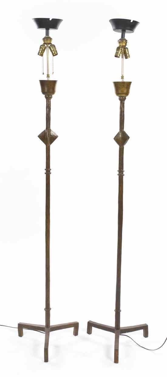 Appraisal: A Pair of Bronze Floor Lamps after a design by